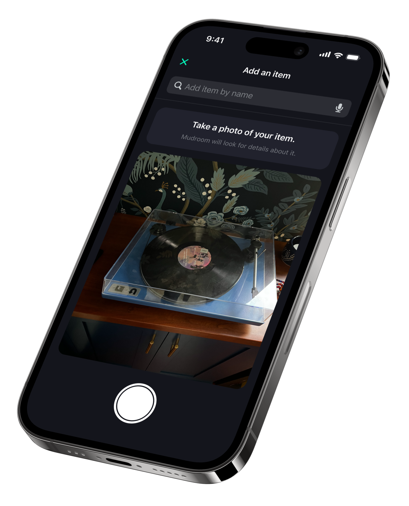 Mudroom app scanning a home item with a phone camera